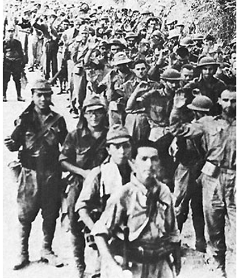 American and Filipino soldiers marching from Bataan to Capas where thousands of them died.